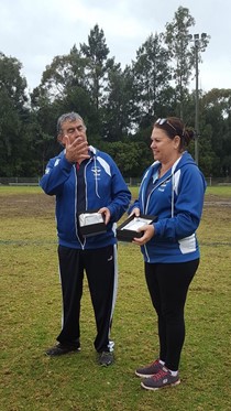 Patricia and Aldo Spennati holding their life membership plaques June 2019
